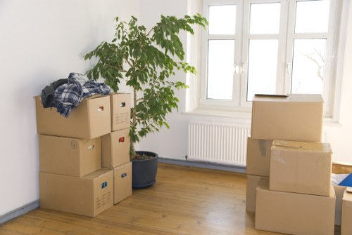 Moving van and packed boxes for a local Westkensington home removal