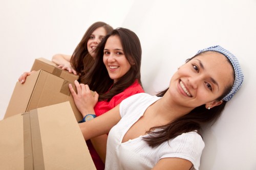 Commercial relocation team loading office equipment for a Westkensington move