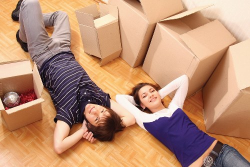Local moving team handling boxes in Westkensington