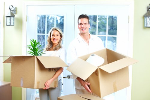 Loading furniture into a removal van on a Westkensington street
